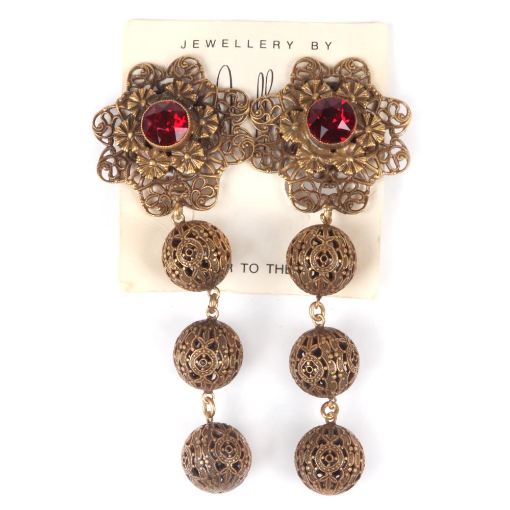 Appraisal: JOSEFF OF HOLLYWOOD HUGE H BRASS OPENWORK FLOWER EARRINGS WITH