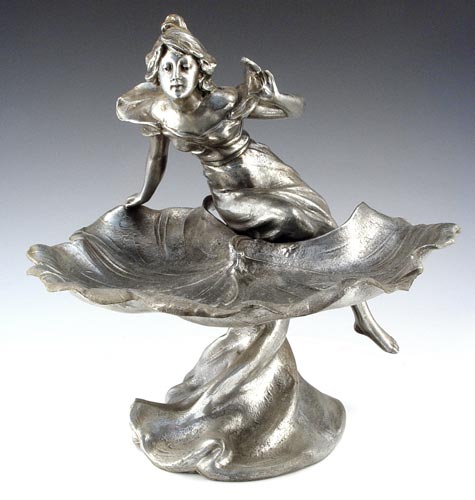 Appraisal: ART NOUVEAU FIGURAL COMPOTE Maiden over a waterlily spelter with