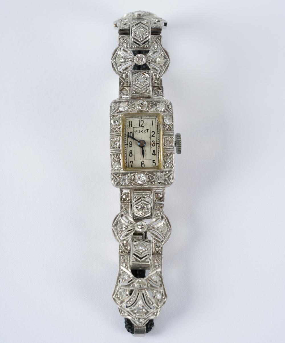 Appraisal: ASCOT PLATINUM DIAMOND ART DECO WATCHset with single cut round