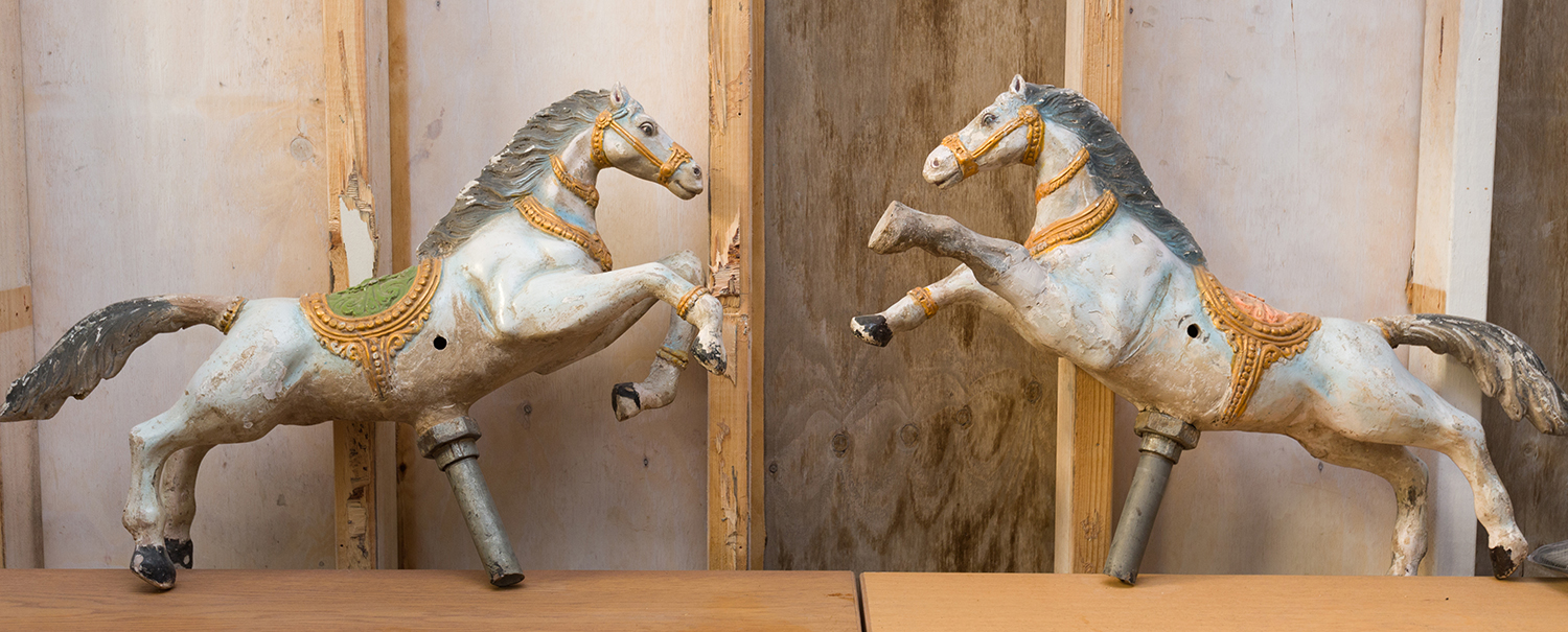 Appraisal: TWO MINIATURE PAINTED CAROUSEL HORSES h x w x d