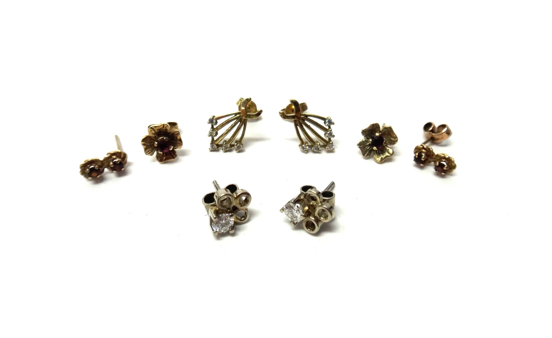 Appraisal: A pair of diamond set single stone earstuds each in