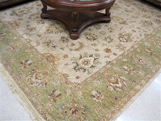 Appraisal: HAND KNOTTED ORIENTAL WOOL CARPET Persian Kashan design overall floral