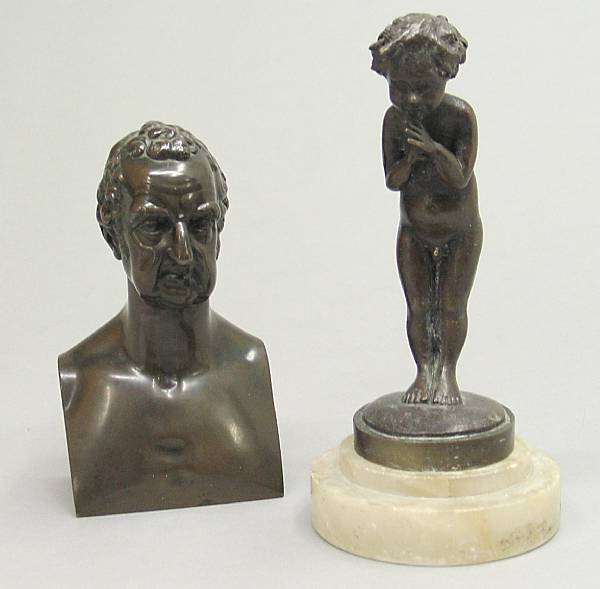 Appraisal: A patinated bronze figure of a boy and a bust