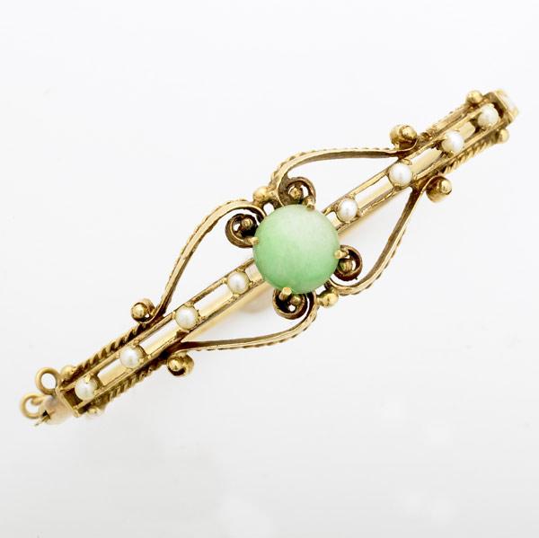 Appraisal: VICTORIAN STYLE GOLD JADE BANGLE k ca with eight seed