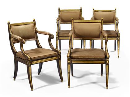 Appraisal: Set of four Regency faux rosewood painted and parcel-gilt armchairs