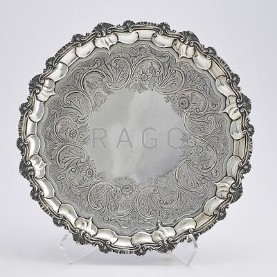 Appraisal: ROCOCO SILVER SALVER Foliate scroll chasings shell rim ball on