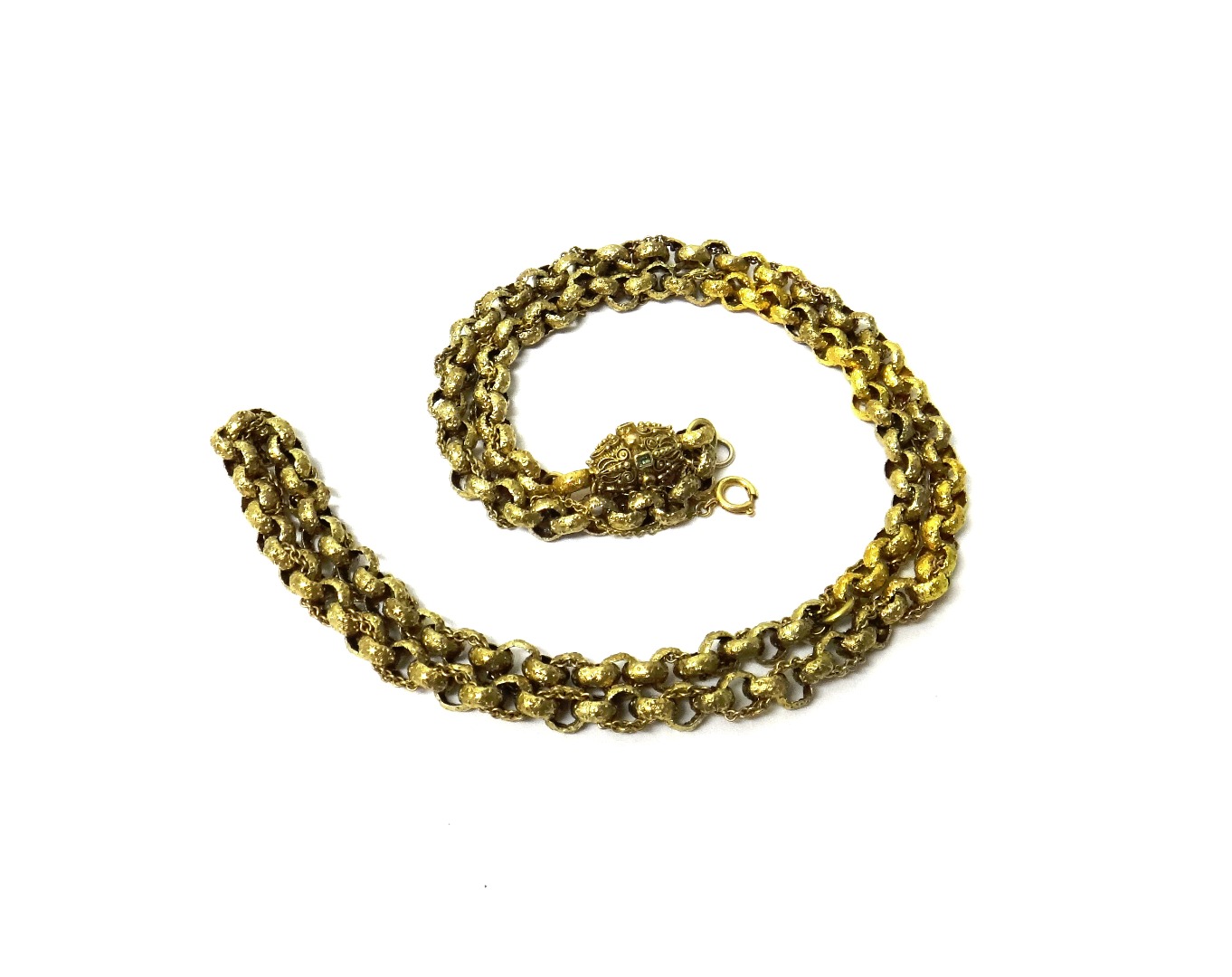 Appraisal: A gold neckchain in a circular link design decorated with