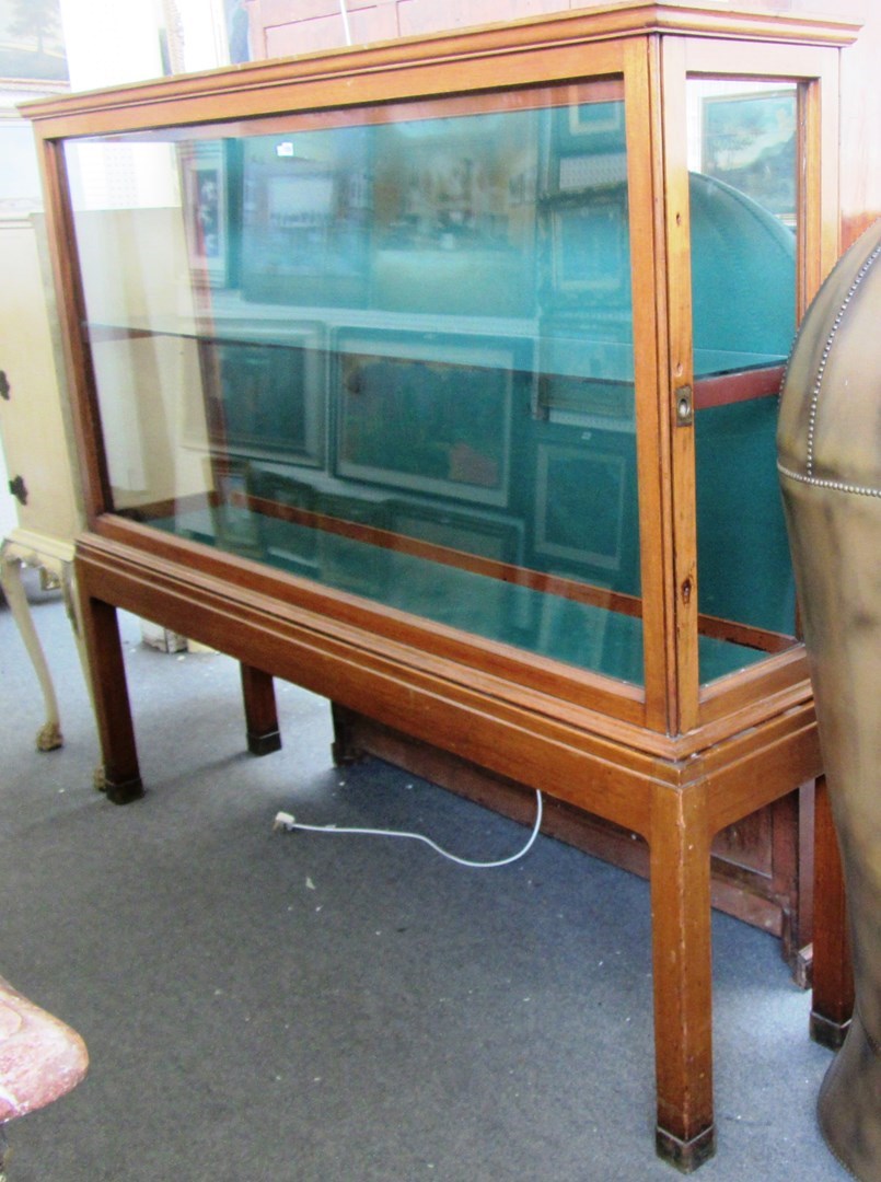 Appraisal: A late th century glazed display case with pair of