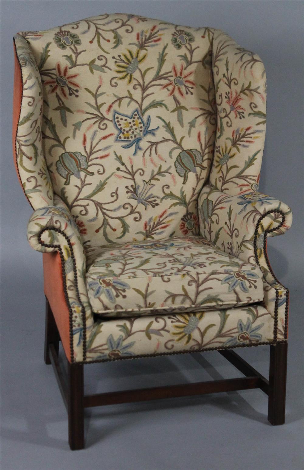 Appraisal: BAKER CHIPPENDALE STYLE MAHOGANY WING CHAIR having an arched tight