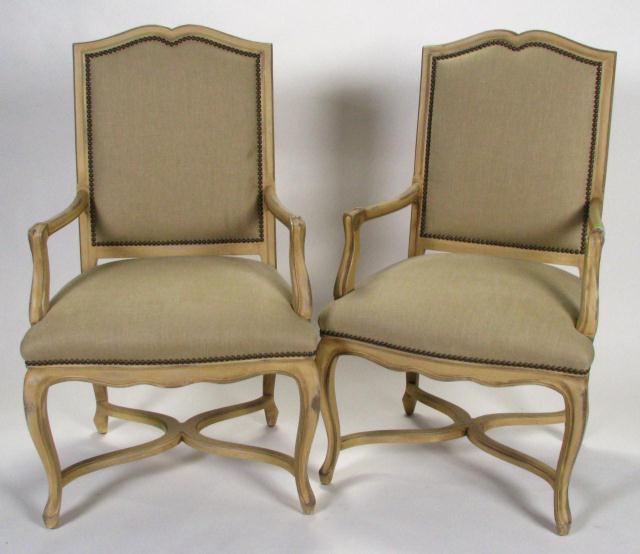 Appraisal: Pair of Country French armchairs with pickled finish sage linen