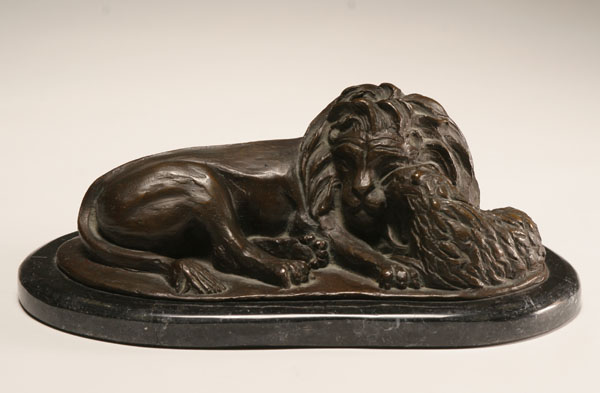 Appraisal: Lion and lamb bronze group on marble plinthe modern rendition