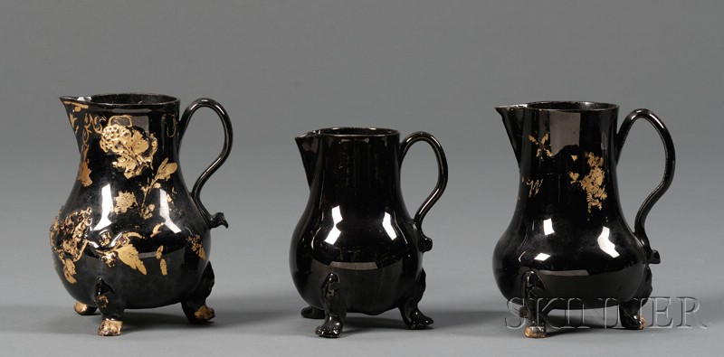 Appraisal: Three Staffordshire Jackfield Black Glazed Cream Jugs England th century