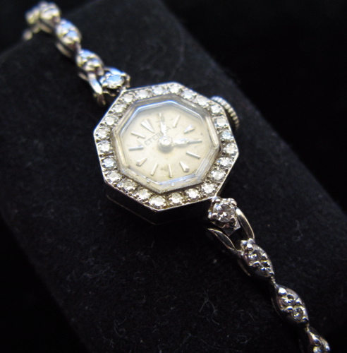 Appraisal: LADY'S DIAMOND AND FOURTEEN KARAT WHITE GOLD WRISTWATCH Eterna Watch