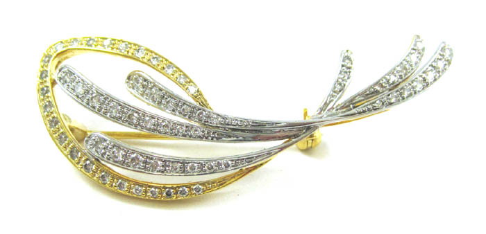 Appraisal: DIAMOND AND FOURTEEN KARAT GOLD BROOCH The yellow and white