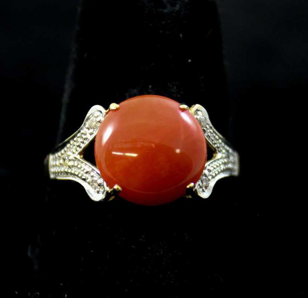 Appraisal: CORAL DIAMOND AND FOURTEEN KARAT GOLD RING The white and