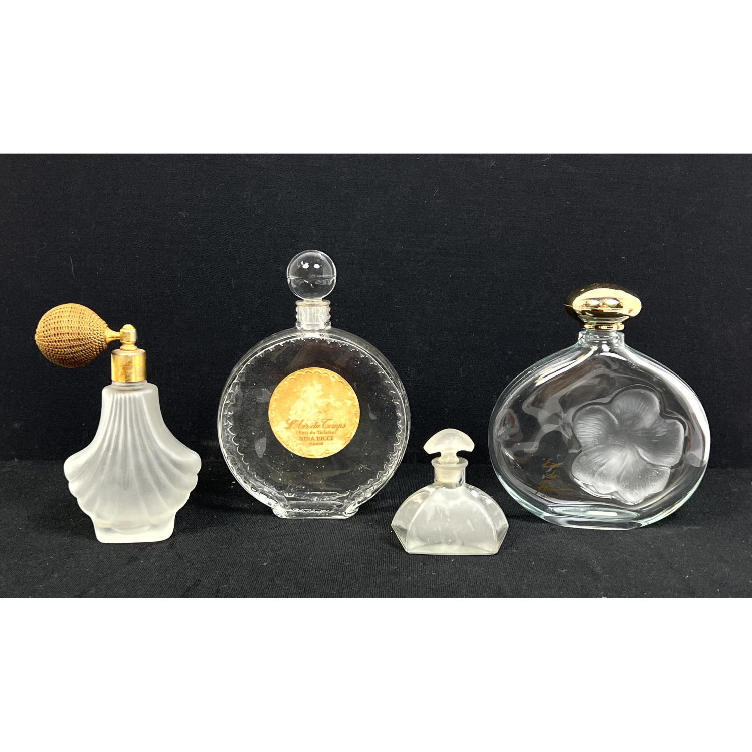 Appraisal: pc Nina Ricci Lalique perfume bottles unmarked Dimensions H inches