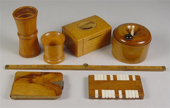 Appraisal: Seven Small Wooden Objects Circa late 's Bank with opening