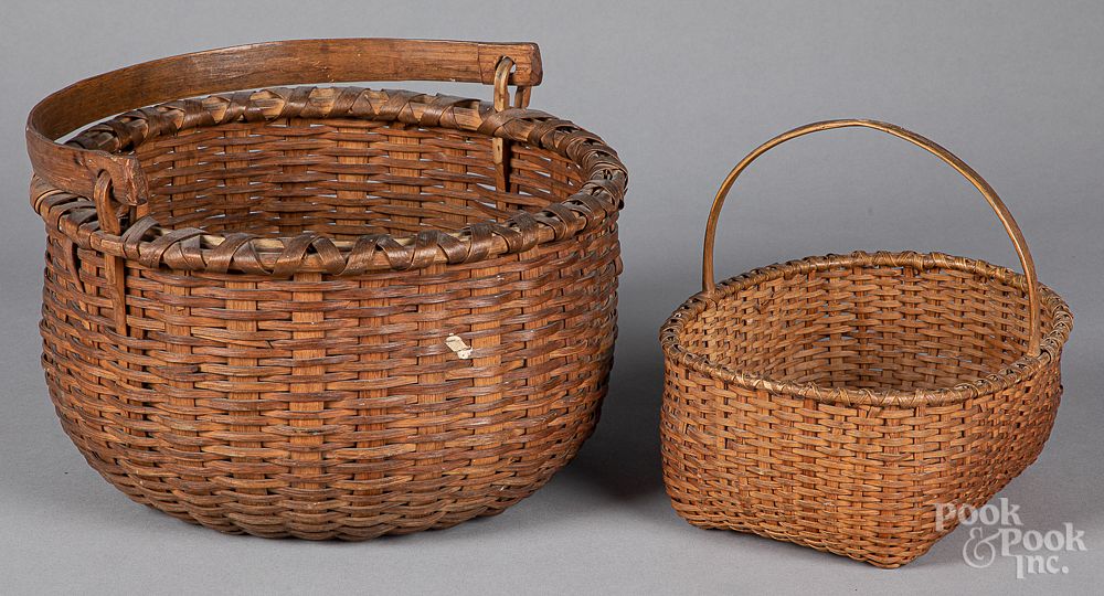 Appraisal: Two woven baskets ca Two woven baskets ca h w