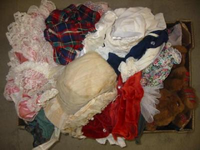 Appraisal: A large quantity of doll's clothing in cotton velvet satin