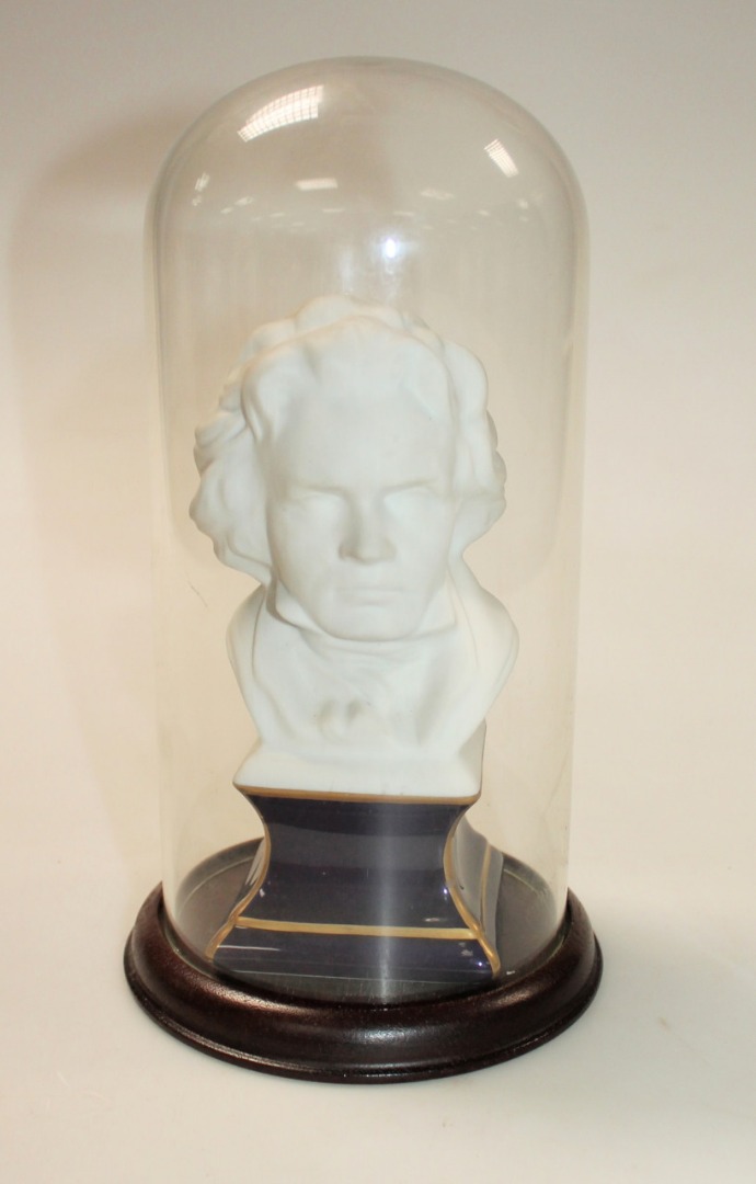 Appraisal: A thC Limoges Parian style bust of Beethoven under a