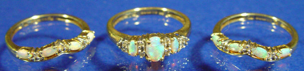 Appraisal: Three assorted gold and moonstone rings