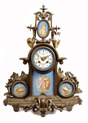 Appraisal: A French porcelain mounted spelter mantel clock the day movement