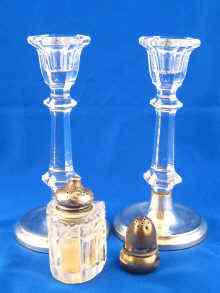 Appraisal: A pair of glass candlesticks with silver mounts Birmingham ht