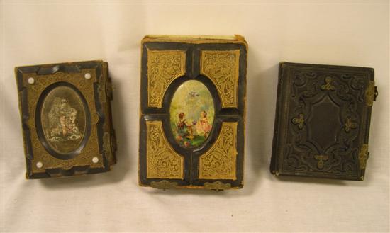 Appraisal: Three Victorian photo albums with an assortment of tin types