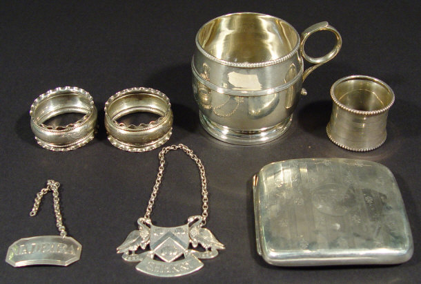 Appraisal: Seven silver items comprised a cigarette case engraved with fleur