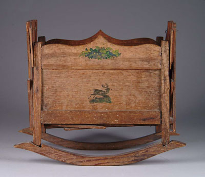 Appraisal: FOLDING CRADLE Interesting wooden doll cradle has accordion folding sides