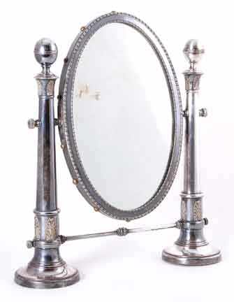 Appraisal: Classical silverplate tabletop mirror acanthus-laden column supporting oval bead-worked framed