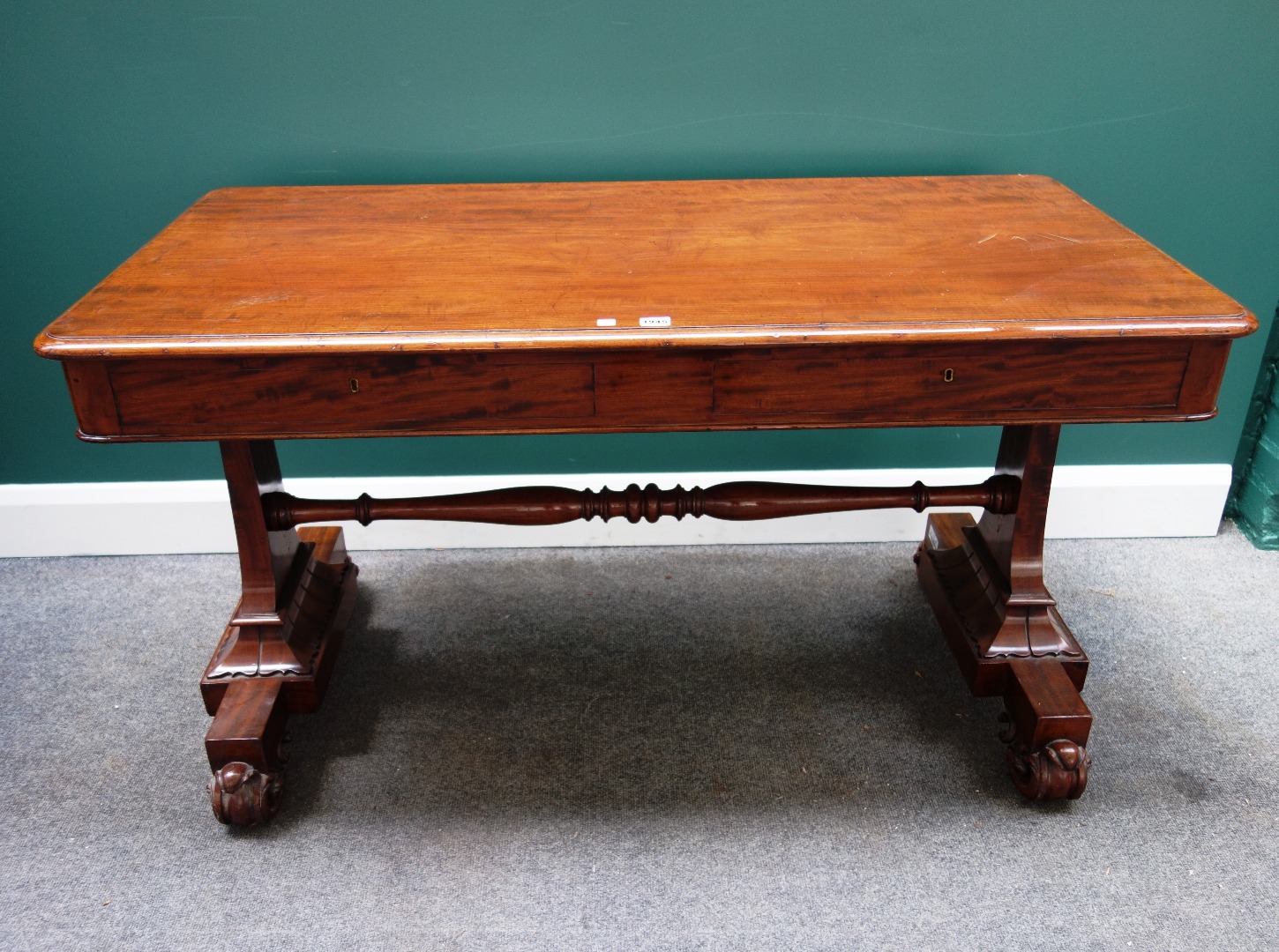 Appraisal: A William IV mahogany writing table the rounded rectangular top