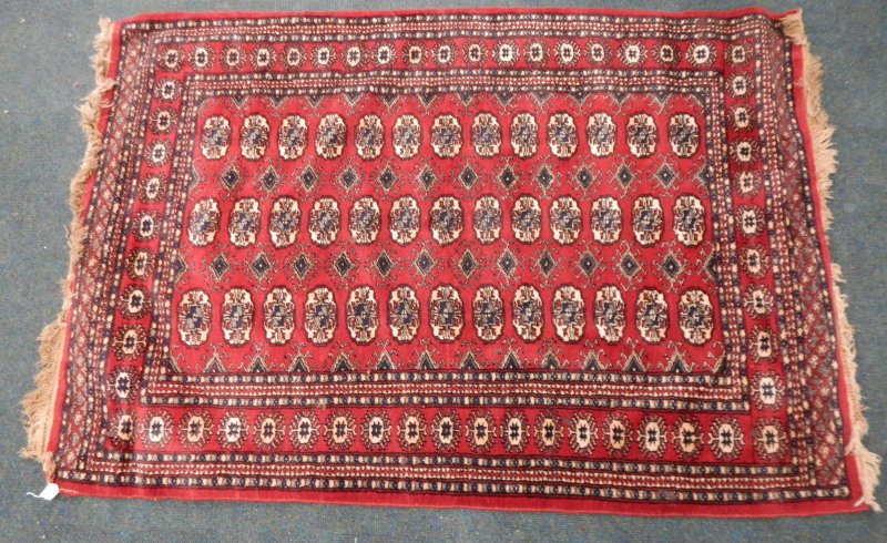 Appraisal: A modern Afghan type rug with a design of medallions