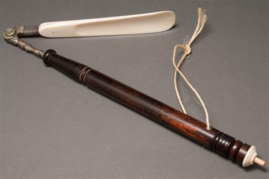 Appraisal: Late Victorian ivory turned wood and metal folding shoe horn