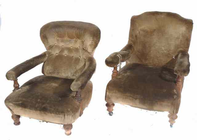 Appraisal: A LATE VICTORIAN ARMCHAIR with brown dralon upholstery arching back