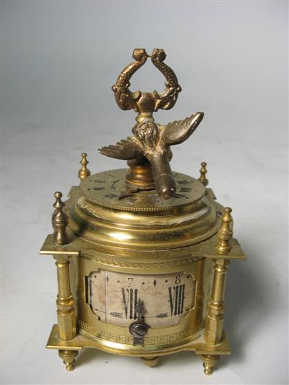 Appraisal: Brass Phalic table clock th th century Circular top with