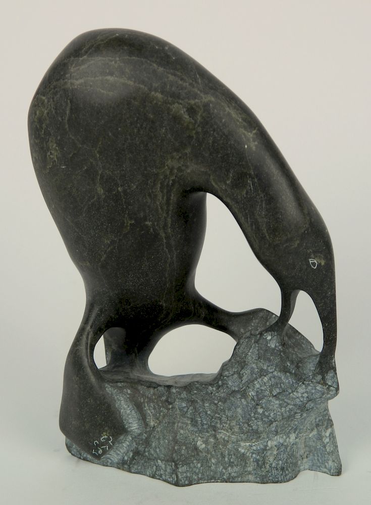 Appraisal: Inuit carved stone Inuit carved stone- of Bird perched on