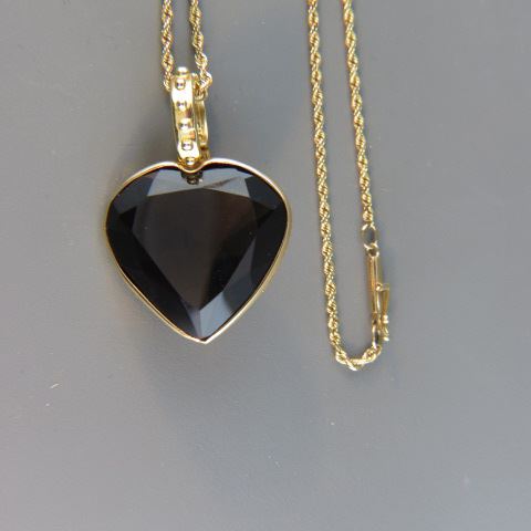 Appraisal: Smokey Quartz Pendant carat heart shapoe gem rope chain all