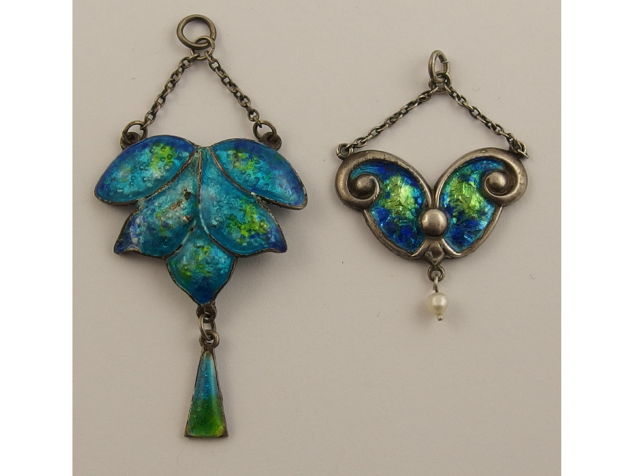 Appraisal: Two enamelled Art Nouveau pendantsthe first is hallmarked for Birmingham