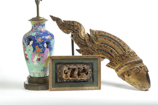 Appraisal: ASIAN CARVINGS AND PORCELAIN LAMP Twentieth century Two architectural wing-shaped