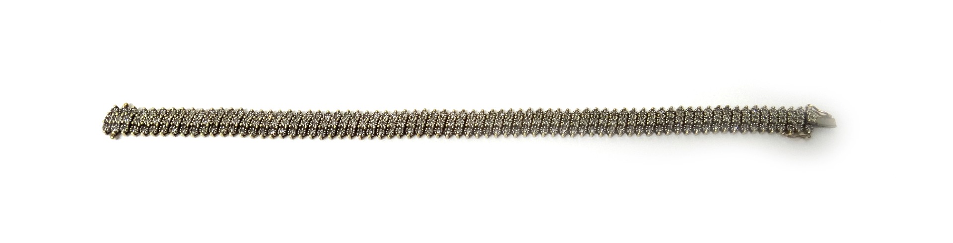 Appraisal: A ct gold and diamond bracelet mounted with three rows