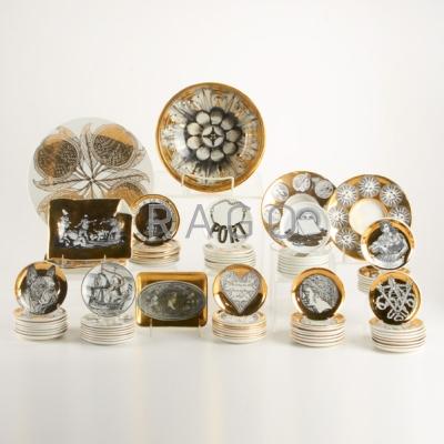 Appraisal: PIERO FORNASETTI Approximately seventy-five pieces including gilt-decorated bowl plates and