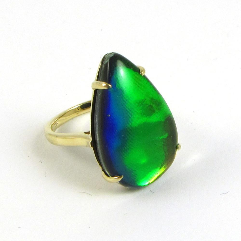 Appraisal: OPAL TRIPLET AND FOURTEEN KARAT GOLD RING with four yellow