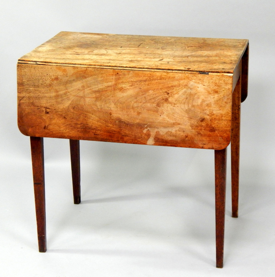 Appraisal: A George III mahogany Pembroke table on square taper legs