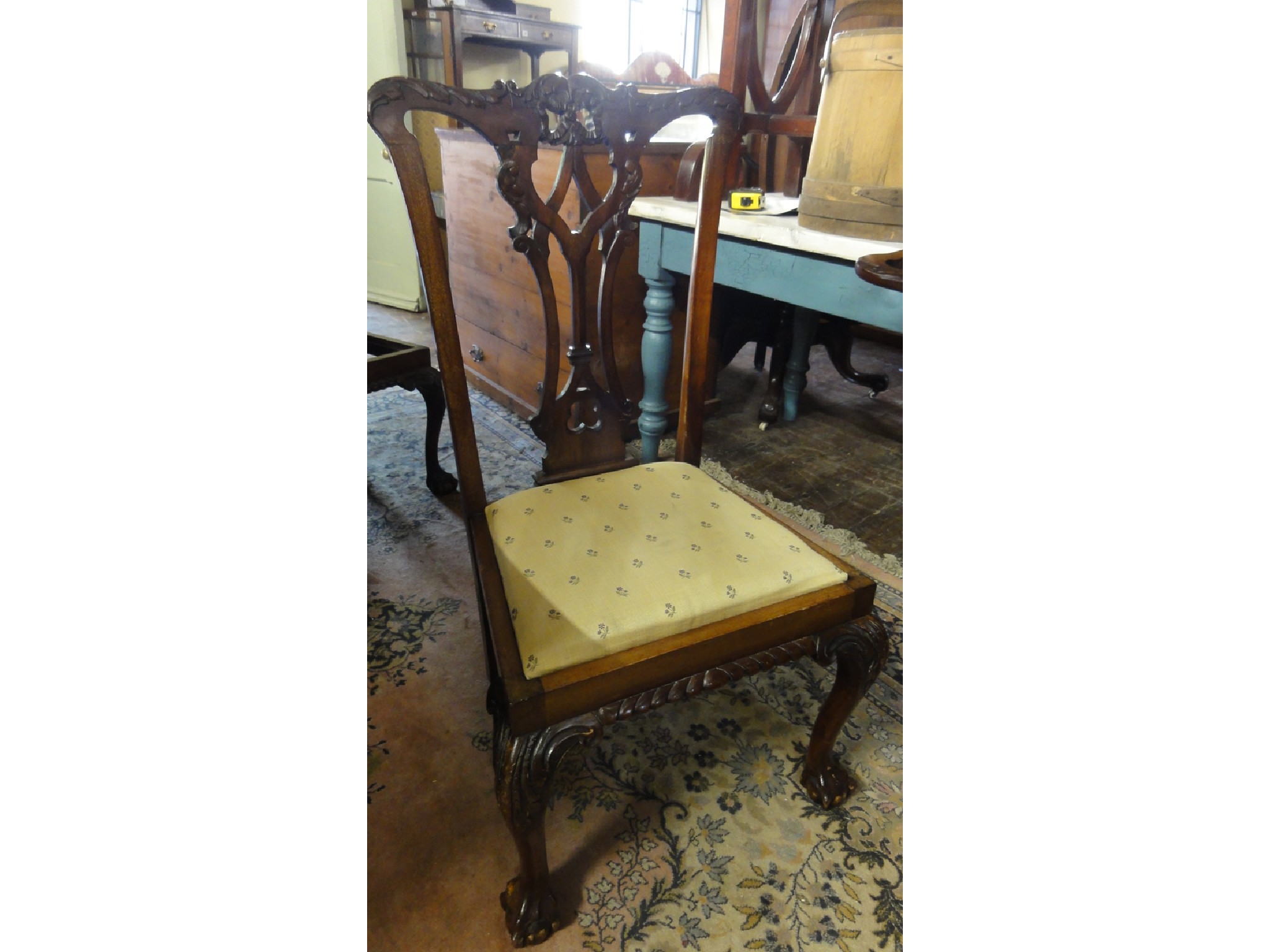 Appraisal: A set of four Edwardian mahogany Chippendale style dining chairs