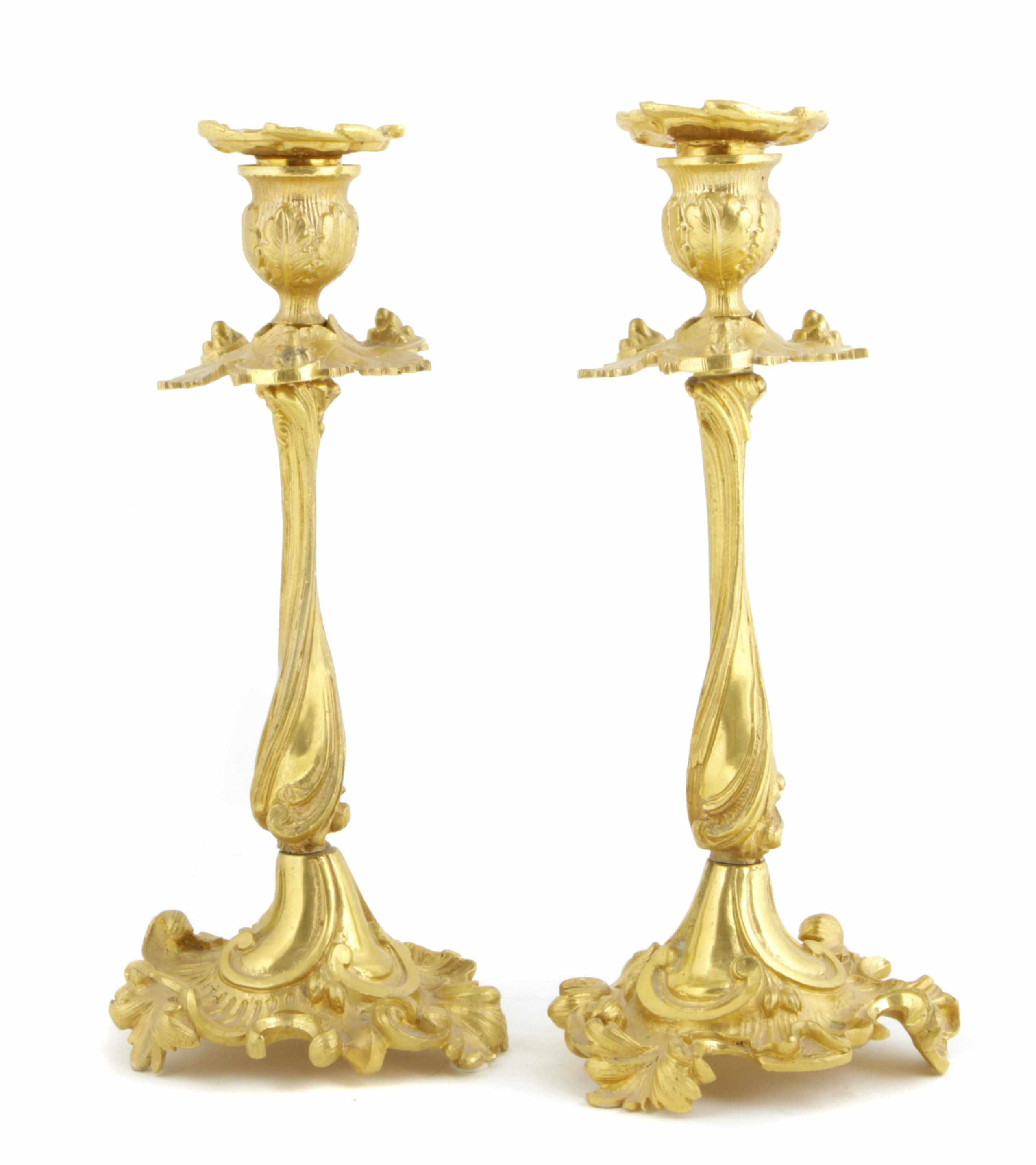 Appraisal: A pair of Rococo style gilt bronze candlesticks th centuryheight