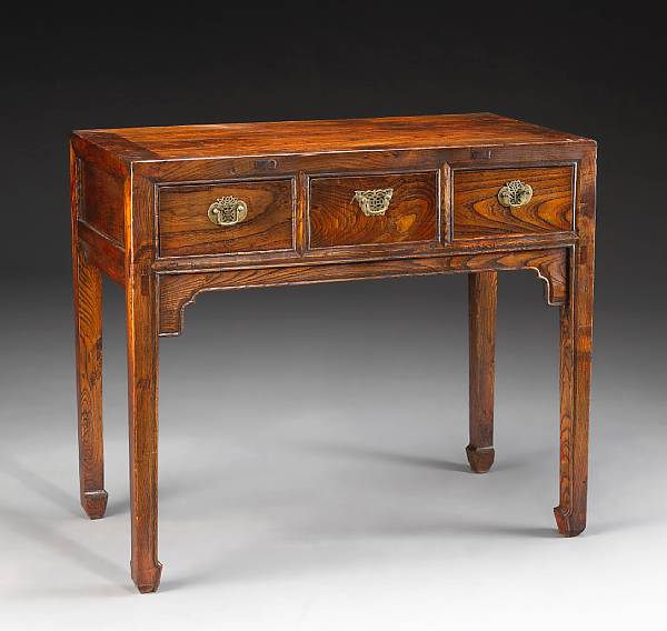 Appraisal: A three-drawer hardwood desk Of rectangular form with pieced floating