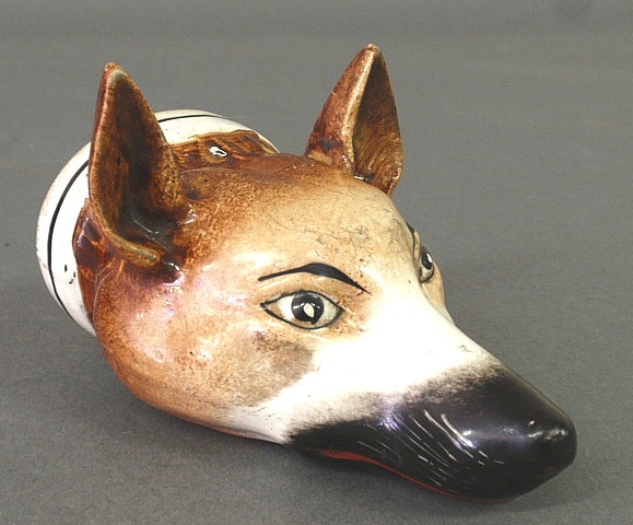 Appraisal: - Staffordshire fox head stirrup cup th c from Pebble