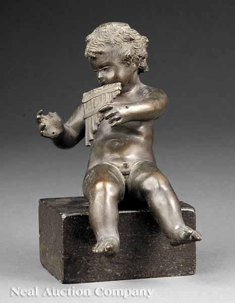 Appraisal: An Antique Continental Bronze of a Putto Playing a Lute