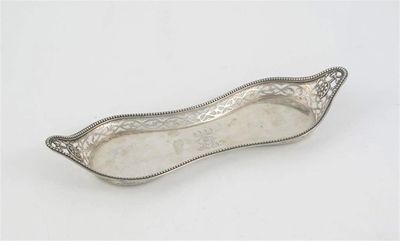 Appraisal: A George III waisted snuffer tray with a pierced gallery